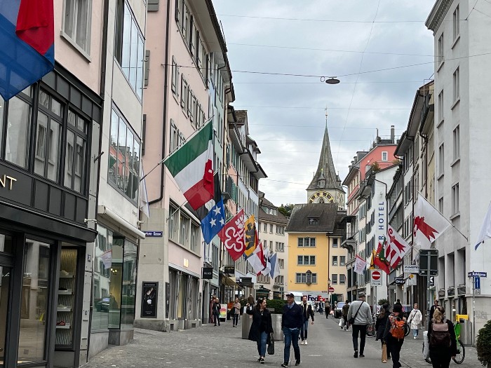 In the shopping area, a colorful street with lots of shops